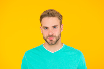 Obraz premium current generation. handsome man unshaven face. sexy guy yellow background. Male barber care. summer male fashion. Hair and beard care. macho man charismatic look. guy sexy and stylish bristle