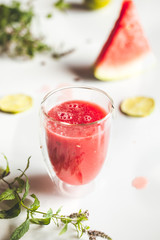 Watermelon juice with mint leaves and lime citrus