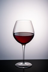red wine in a wine glass on the background1