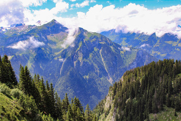 Fototapeta premium Colorful mountain landscape of the Swiss Alps on a summer day 