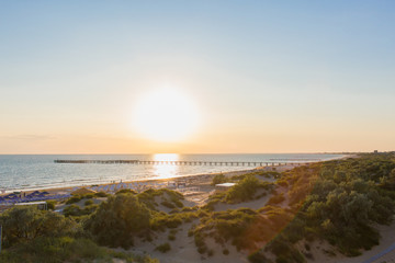 Sunrise over the sea at hot summer evening