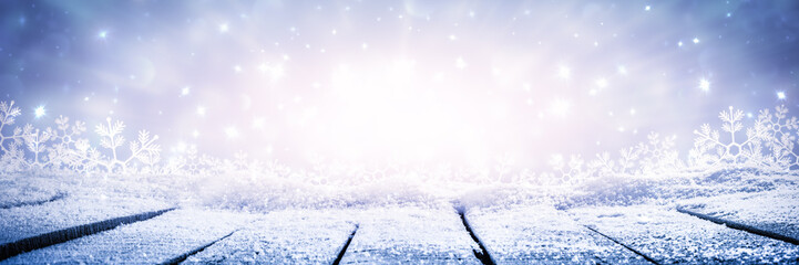 Banner Of Wooden Plank Table With Sparkling Snow And Brilliant Explosion Background - Winter