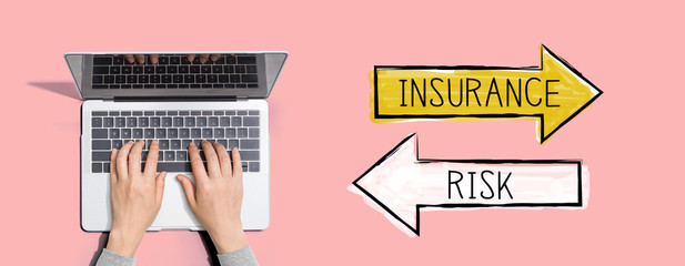 Insurance or risk with person using a laptop computer
