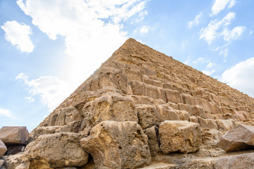 Fototapeta na wymiar Closeup view on a great pyramid of Cheops in Giza plateau. Cairo, Egypt