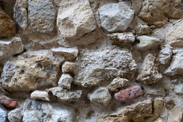 Very old Textured rock wall