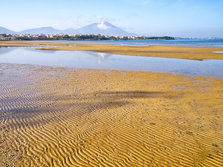 Beach with sand ripples during low tide, Liani Ammos in Chalkida, Greece.
