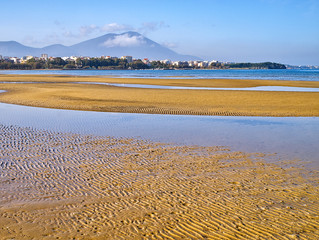 Beach with sand ripples during low tide, Liani Ammos in Chalkida, Greece.