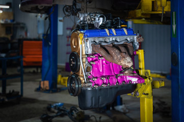 Fototapeta premium Old engine after overhaul in car workshop