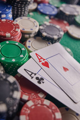two aces on the poker table and chips. casino, poker, a pair of aces