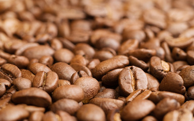 Flat lay photo of coffe beans pile with circular white empty space in the middle