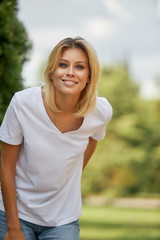 Portrait of a woman, closeup portrait of a nice female looking at camera.Concept woman lifestyle,happy healthy summer vacation.