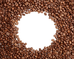 Flat lay photo of coffe beans pile with circular white empty space in the middle