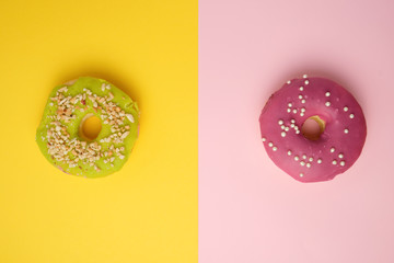 round different donuts with sprinkles on a bright multi-colored background