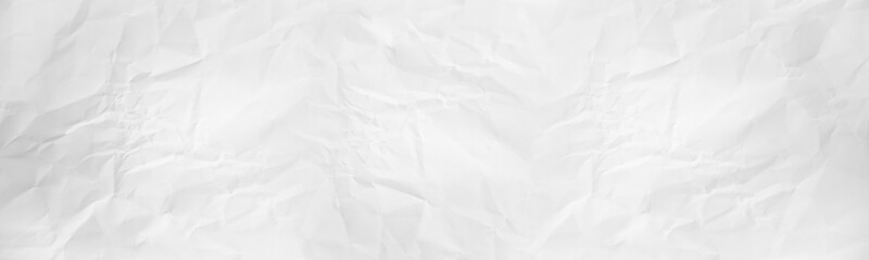 wide panorama crumpled paper texture background. crush paper so that it becomes creased and wrinkled.