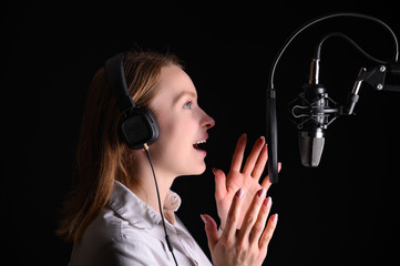 Radio host working on the radio, or in the studio a singer, blogger, TV worker, voice acting for a...
