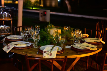 table set for outdoor evening dining