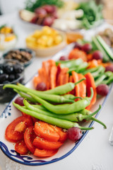 Turkish Breakfast, egg, tomatoes, Cucumber, olive, bread. Turkish fast food bagel called Simit.