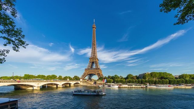 View of Eiffel tower and river Seine with blue sky - 4k time-lapse