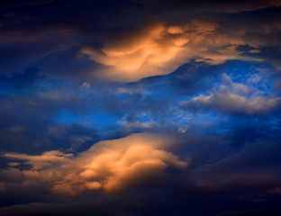 Naklejka na ściany i meble Vivid sky of cloudy evening