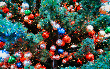 Obraz na płótnie Canvas Christmas Tree with Balls on Christmas Market in Winter Berlin, Germany. Glass