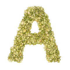 Letter A of the English alphabet from freshly  green chopped peas  on a white isolated background....
