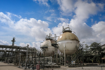 Petroleum industrial plant on blue sky background, Downstream of fossil petroleum plant,Gas storage