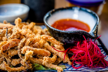Fried squid with spices and sauce