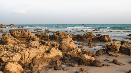 Landscape with rock on the beach, sunset view, Rayong, Thailand