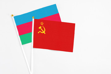 Soviet Union and Azerbaijan stick flags on white background. High quality fabric, miniature national flag. Peaceful global concept.White floor for copy space.