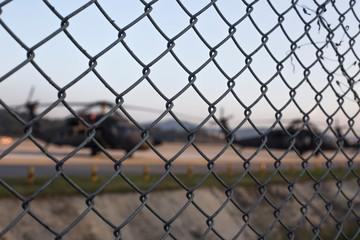 Fototapeta premium helicopter runway behind the fence