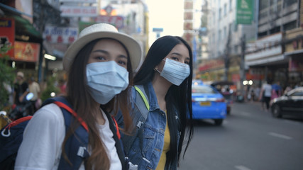 Concept of pollution prevention. Asian women are allergic to air pollution with in the city. 4k Resolution.