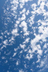 Blue sky and clean white clouds as a nature background