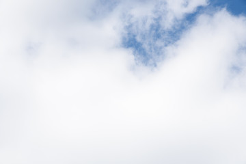 Blue sky and clean white clouds as a nature background