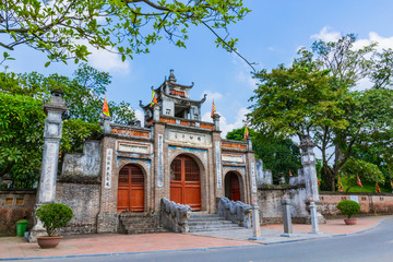Fototapeta na wymiar The main gate of Thuong shrine in ancient Co Loa citadel, Vietnam. Co Loa was capital of Au Lac (old Vietnam), the country was founded by Thuc Phan about 2nd century BC.