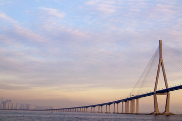 The sunset site is the Incheon Bridge in Korea.