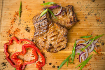 Grilled steak with vegetables. Pork. - 302362287