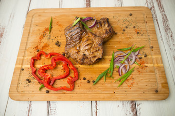 Grilled steak with vegetables. Pork. - 302362288
