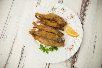 small breaded fish with spices - 302363212