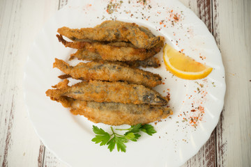 small breaded fish with spices - 302363230