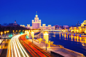 Fototapeta na wymiar Sunset over famous landmarks - Kotelnicheskaya Embankment Building in Moscow, Russia
