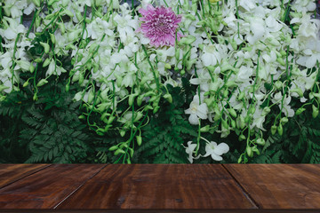 purple chrysanthemum & white orchid flower decoration. natural background