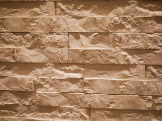 uneven stone facade close-up. Torn stone texture. Stone wall. Stonewall abstract background