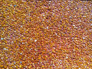 Texture of pebble stones cement wall