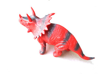 Tyrannosaurus dinosaurs toy isolated on light white background with clipping path.