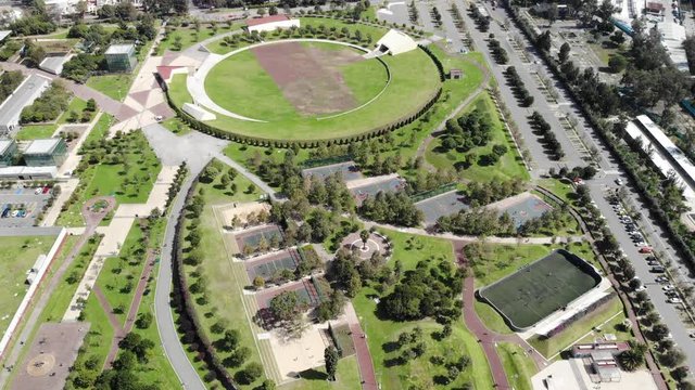 Aerial view of Parque Bicentenario in Azcapotzalco, Mexico City. Drone flying forward.