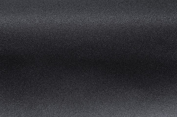 Black glittering glowing metallic background.