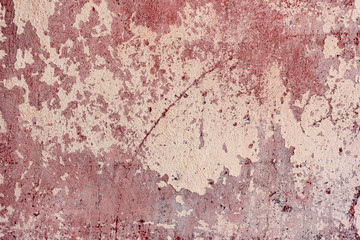 Texture of a concrete wall with cracks and scratches which can be used as a background