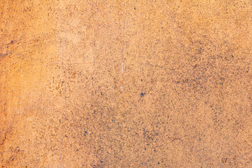 Texture of a concrete wall with cracks and scratches which can be used as a background