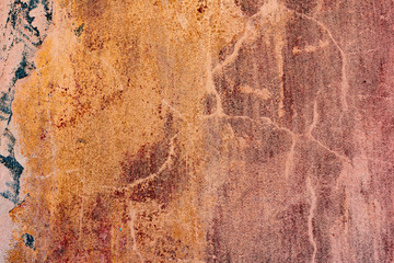 Texture of a concrete wall with cracks and scratches which can be used as a background