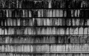 Background texture black and white stained stucco old. White brick wall background color in a rustic room. Grungy rust block of stone. Old wallpaper architecture used for general work.